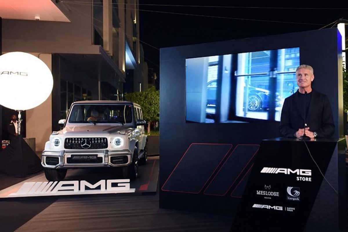 A person giving a speech about AMG Store